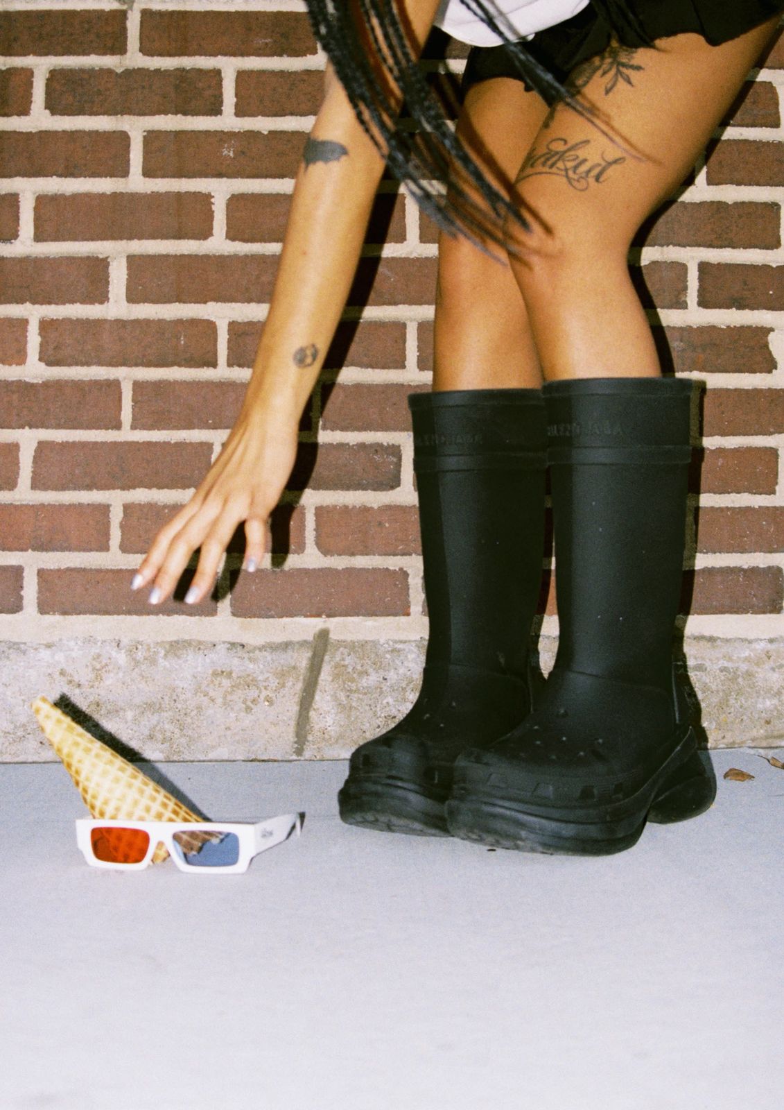 White frames, boots, ice cream