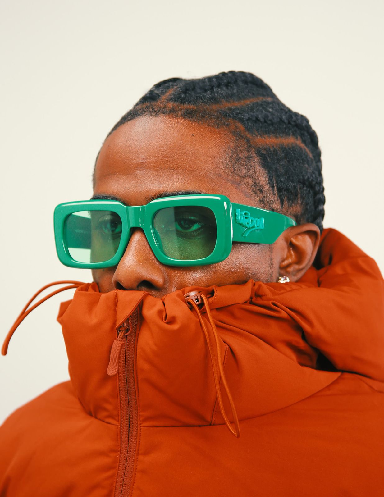 Green frames, orange puffer
